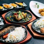 달라지는 식단 트렌드, 건강하게 따라잡는 5가지 실생활 습관 grilled fish dish